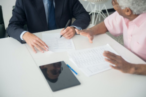 business broker helping with documents for selling the company